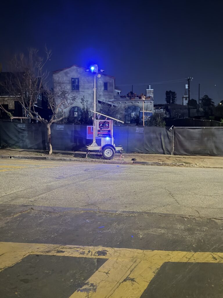 Mobile security camera trailer beside a Palisades street; photo from Circling the News